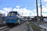 Northbound Tri-Rail train arriving into Hialeah Market Station behind a Rotem Cab Car